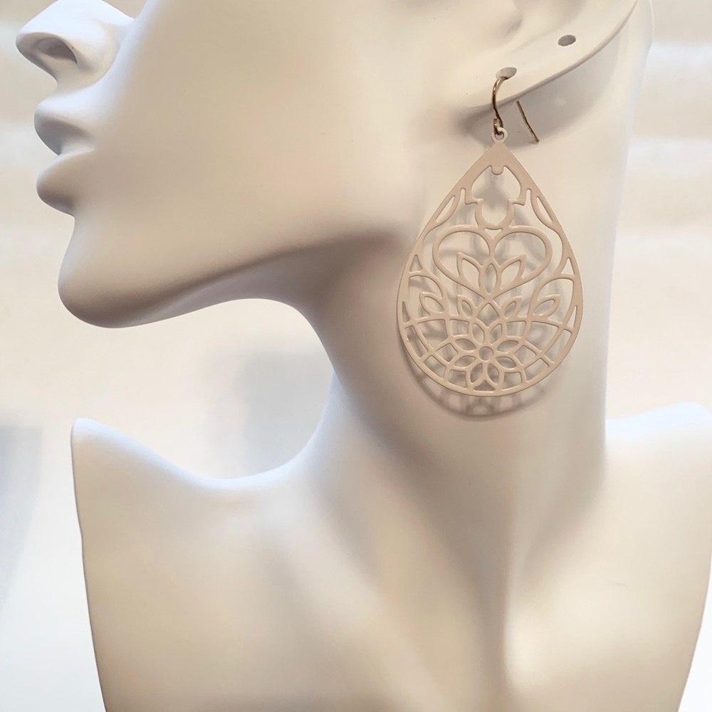 2/$10 Women’s white lotus design earrings